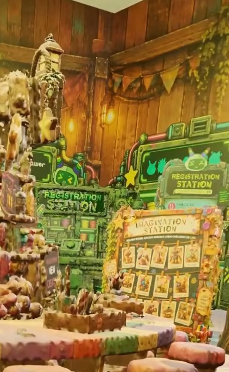 Individual seating and workspaces surrounding Creation Station.
